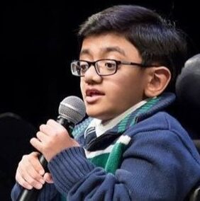 Sparsh shah image holding mic in hand